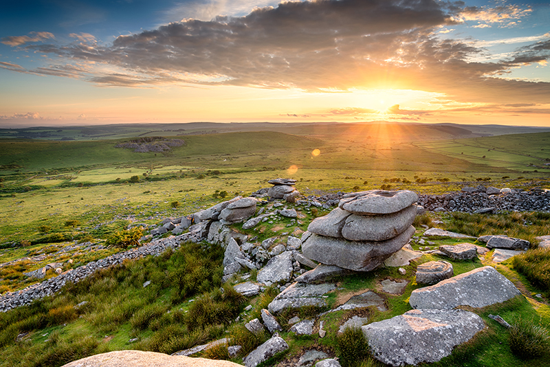 Sunset over the Cheesewring rocks on Bodmin Moor in Cornwall