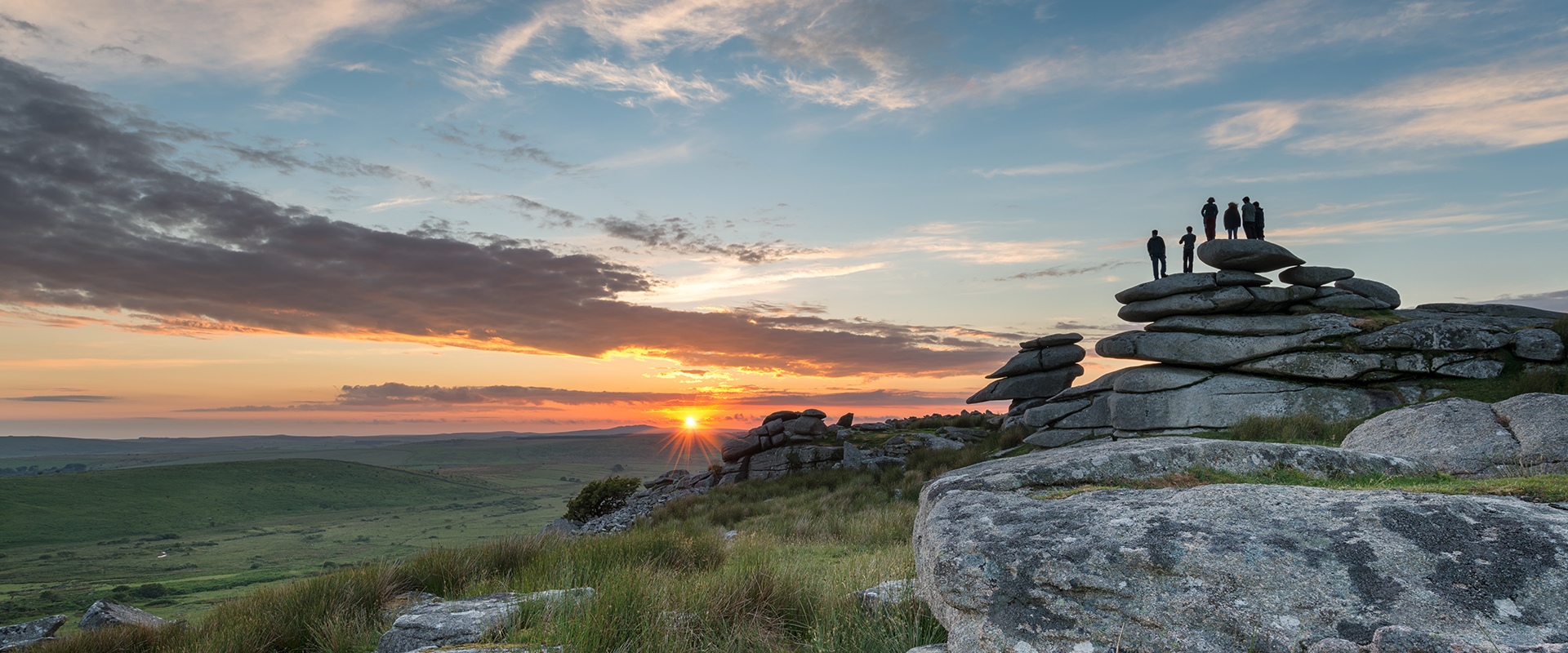 Sunset over Cheesewring granite tor on Bodmin Moor, North Cornwall