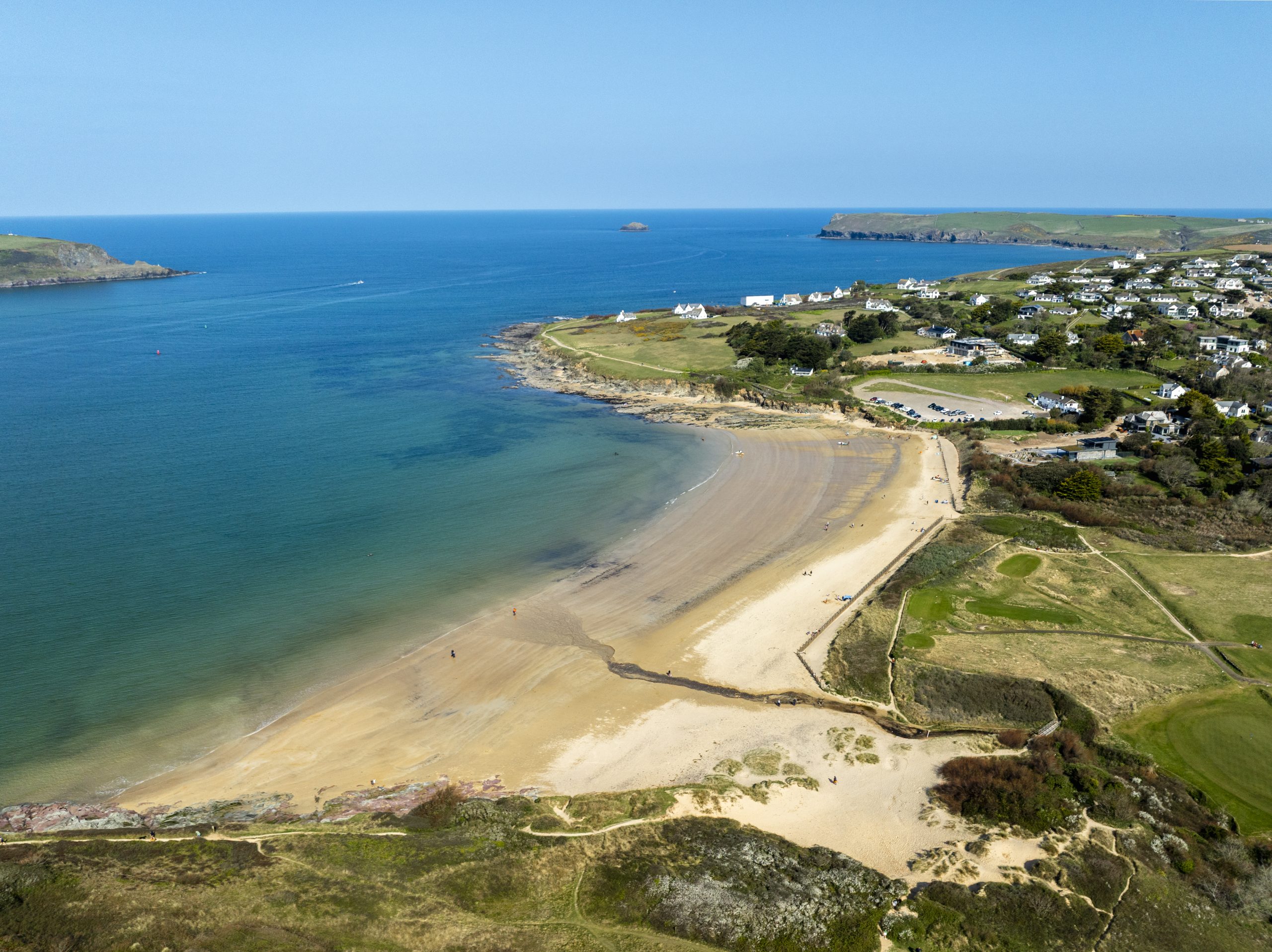 Daymer Bay beach near Rock in Cornwall close to St Minver with sandy shoreline and coastal views