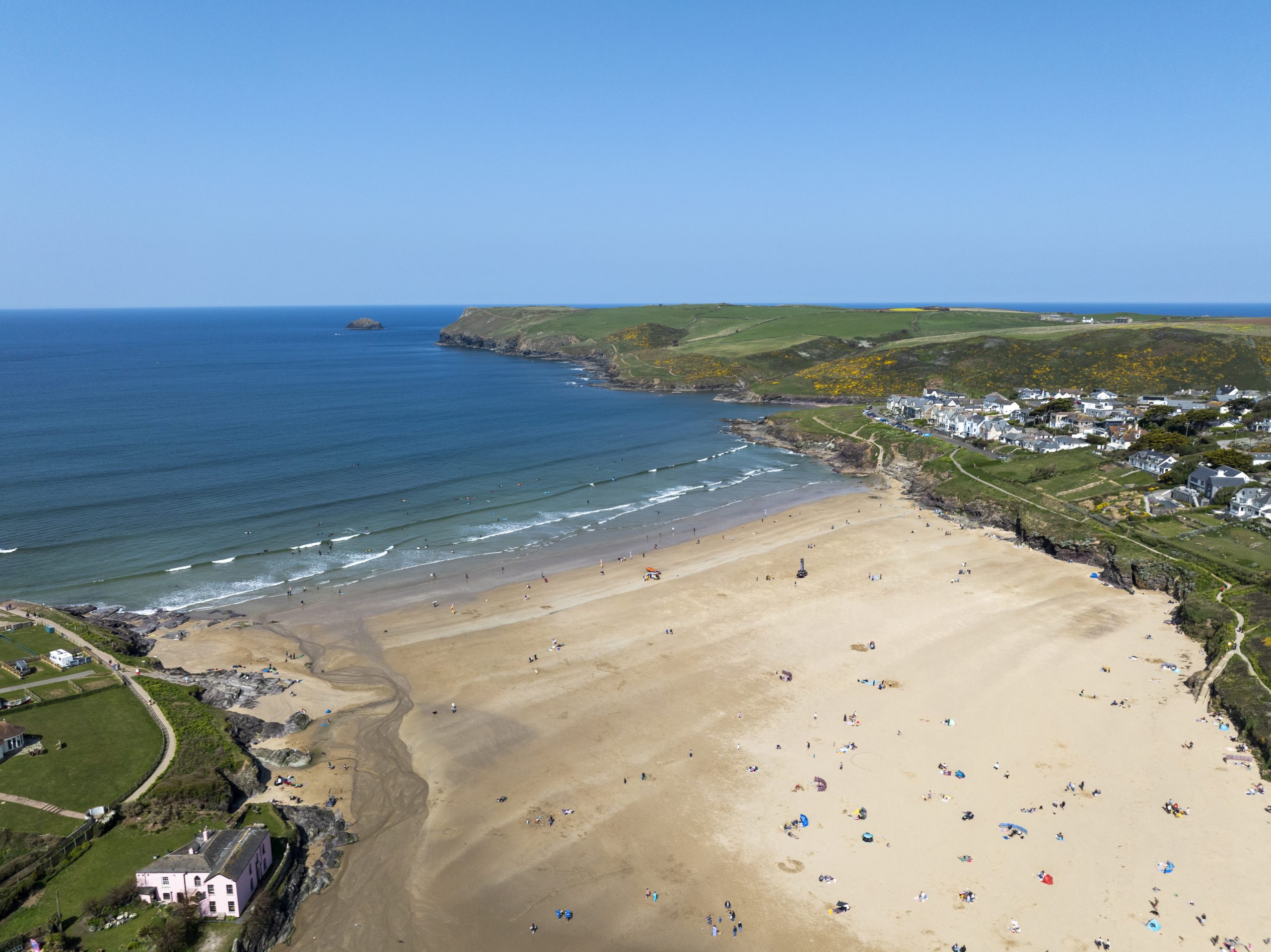 Polzeath Beach in Cornwall near St Minver with sandy beach and coastal views