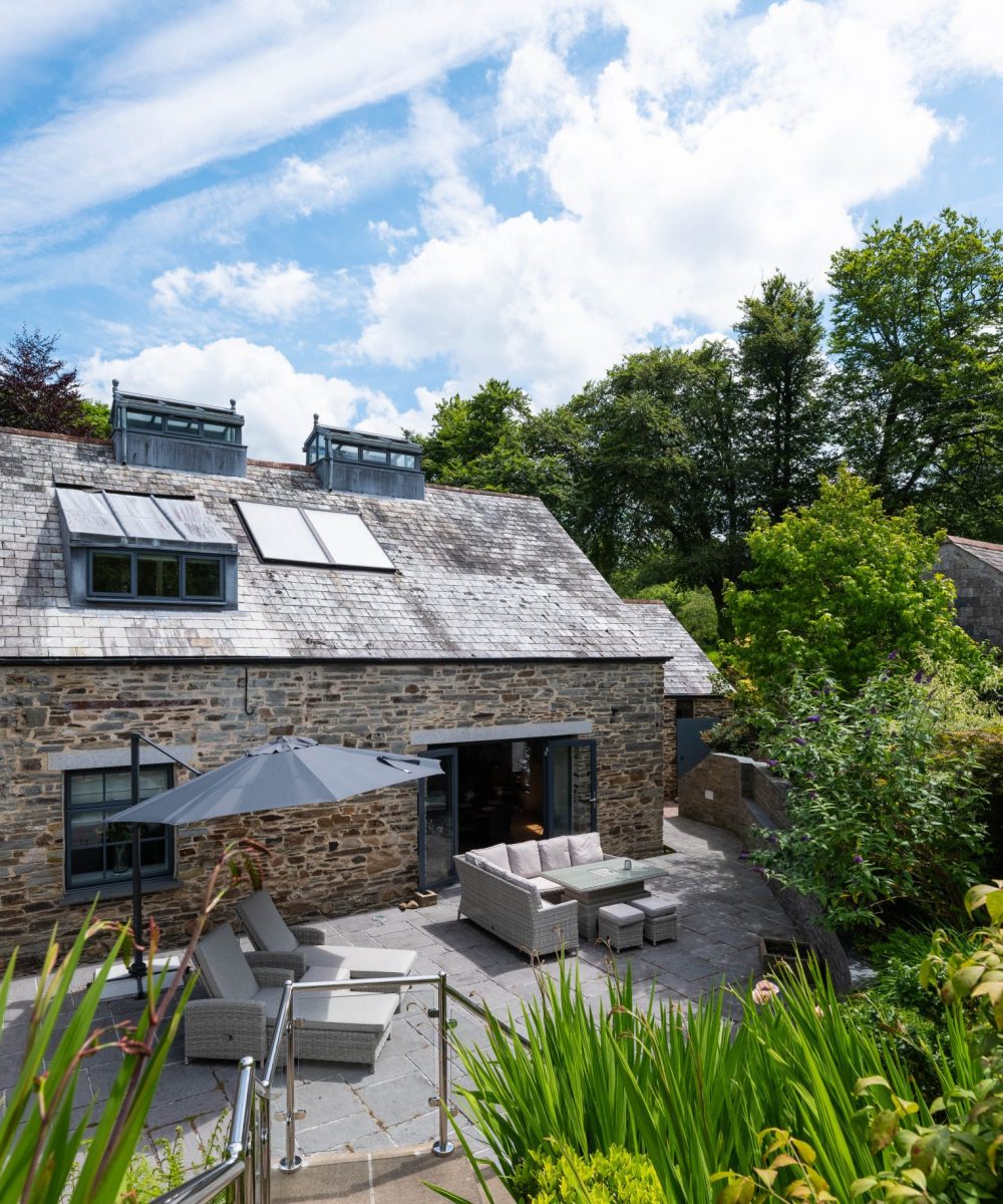 Exterior view of The Forge holiday home with private patio and garden in Bodmin, Cornwall