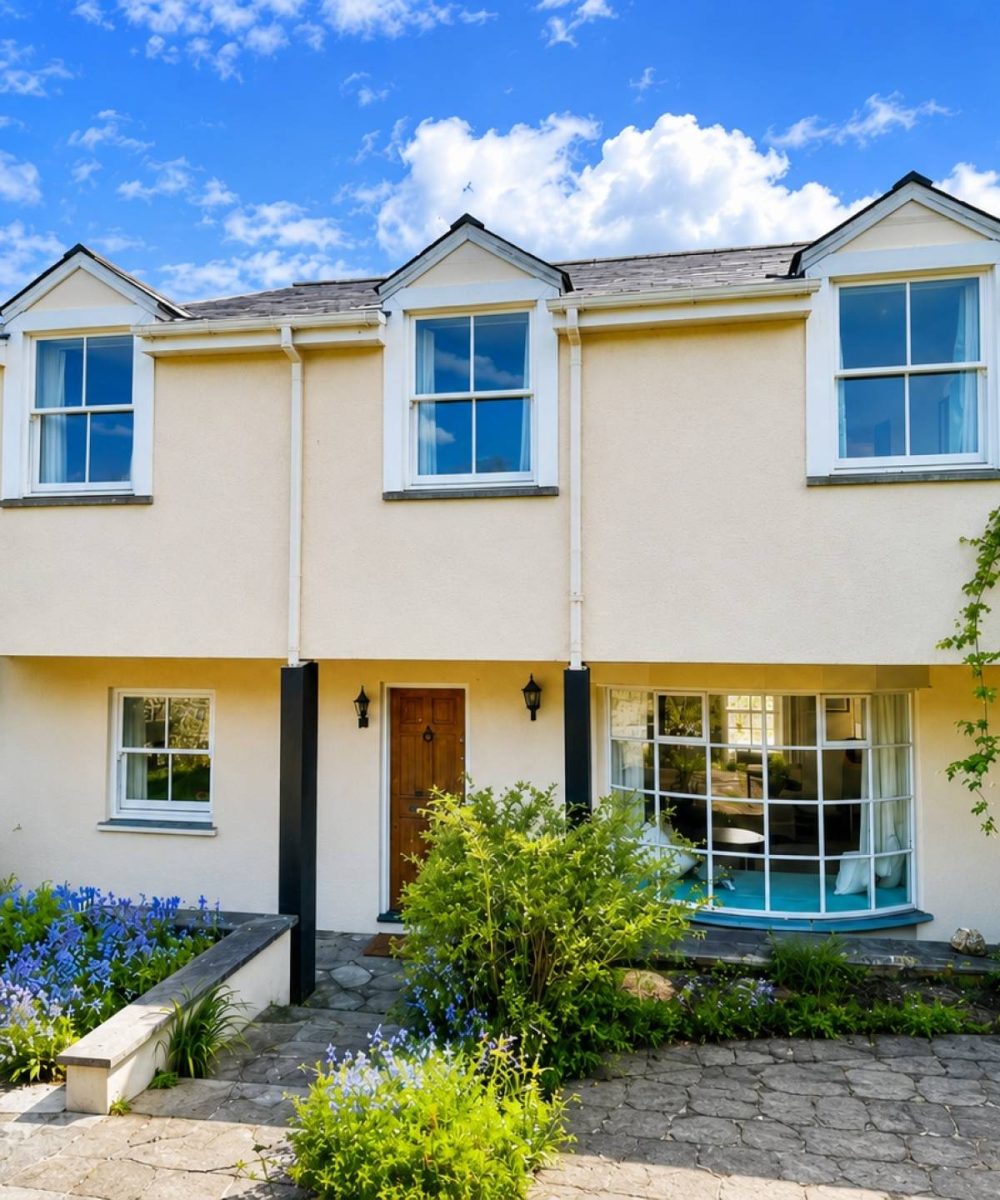 sunny_suburban_home_with_vibrant_garden opt